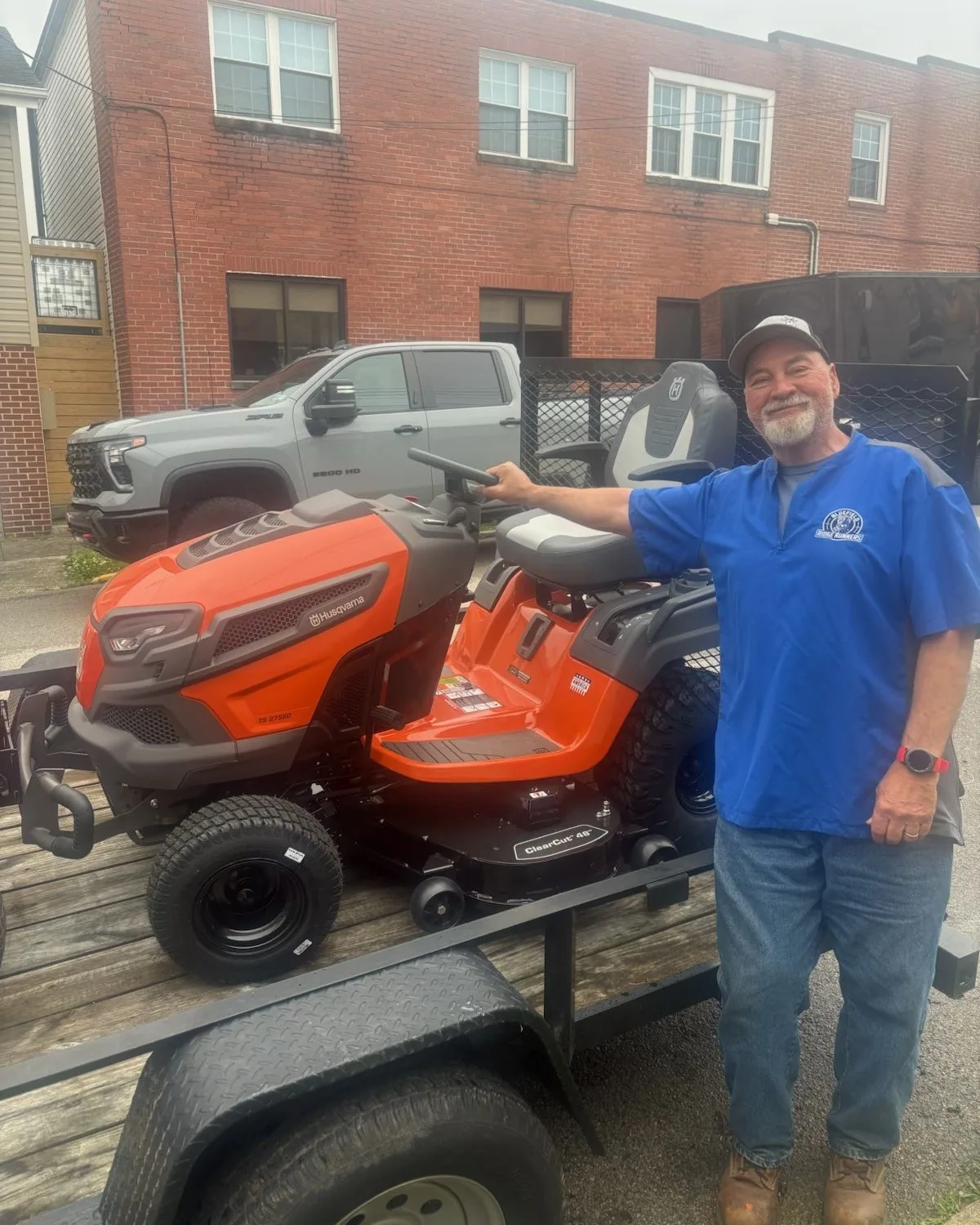 Evergreen customer with a new Husqvarna riding mower